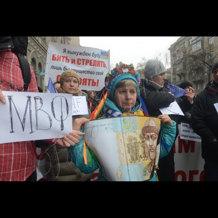 17 листопада 2014. Біля НБУ відбувся довгостроковий мітинг «Банківський бунт-повстання рабів». Організатори:  Рух Громадський Контроль банків, Рух Кредитний Майдан, ГО 